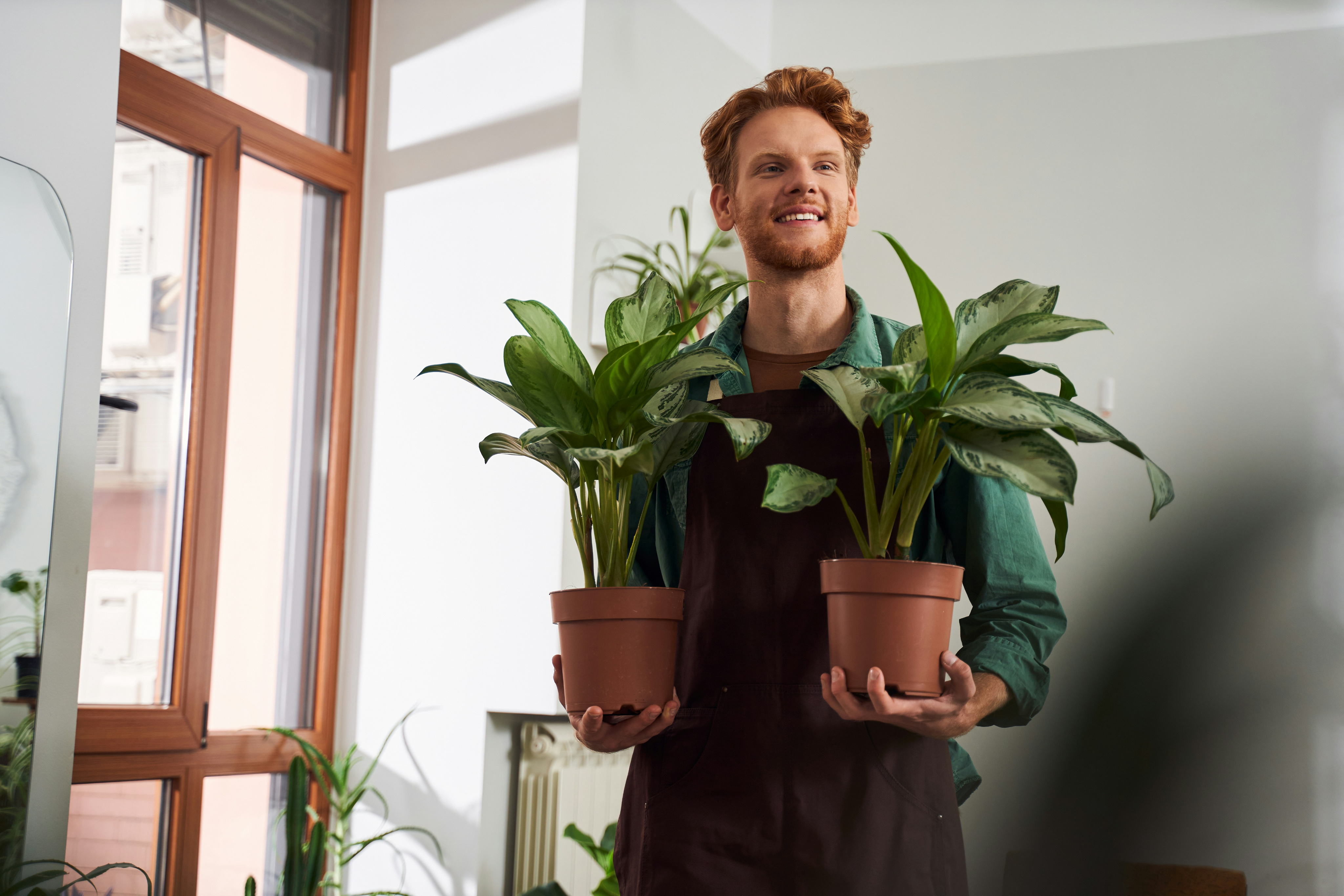 man-holding-2-flowers