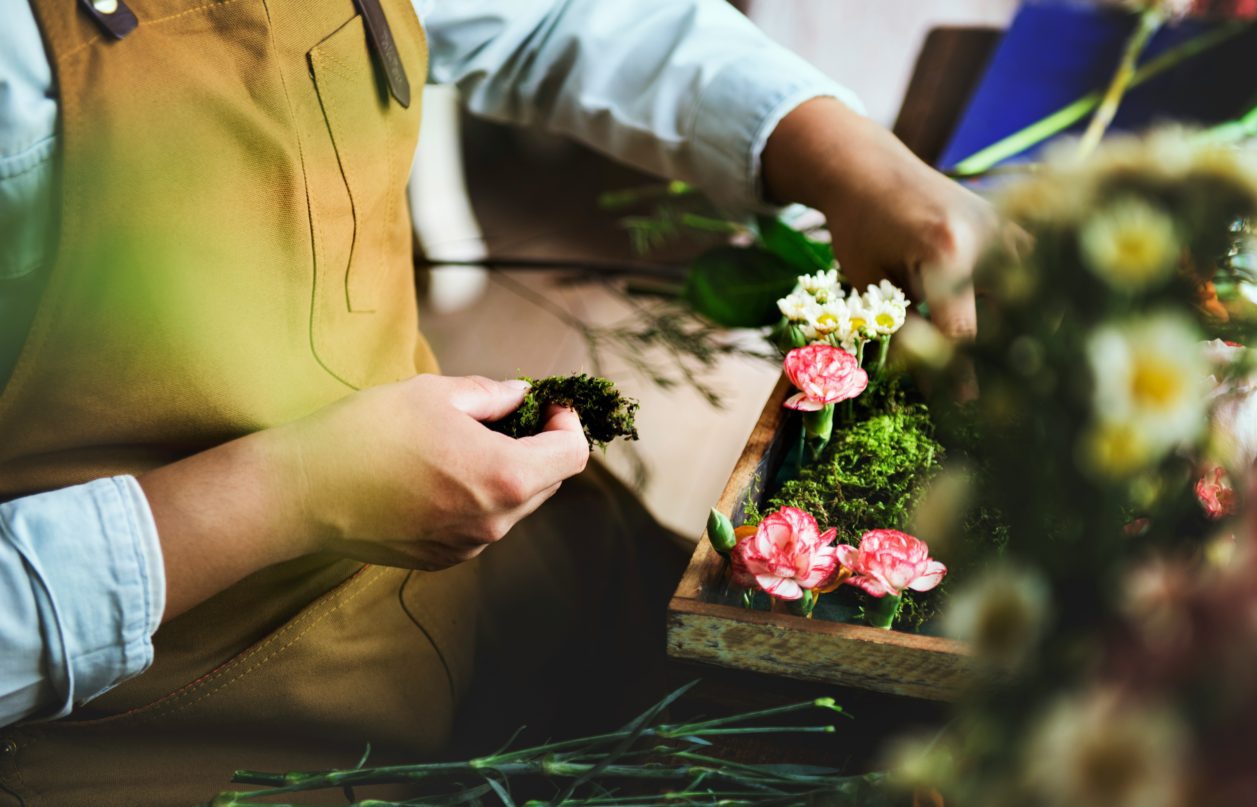 man-working-with-flowers